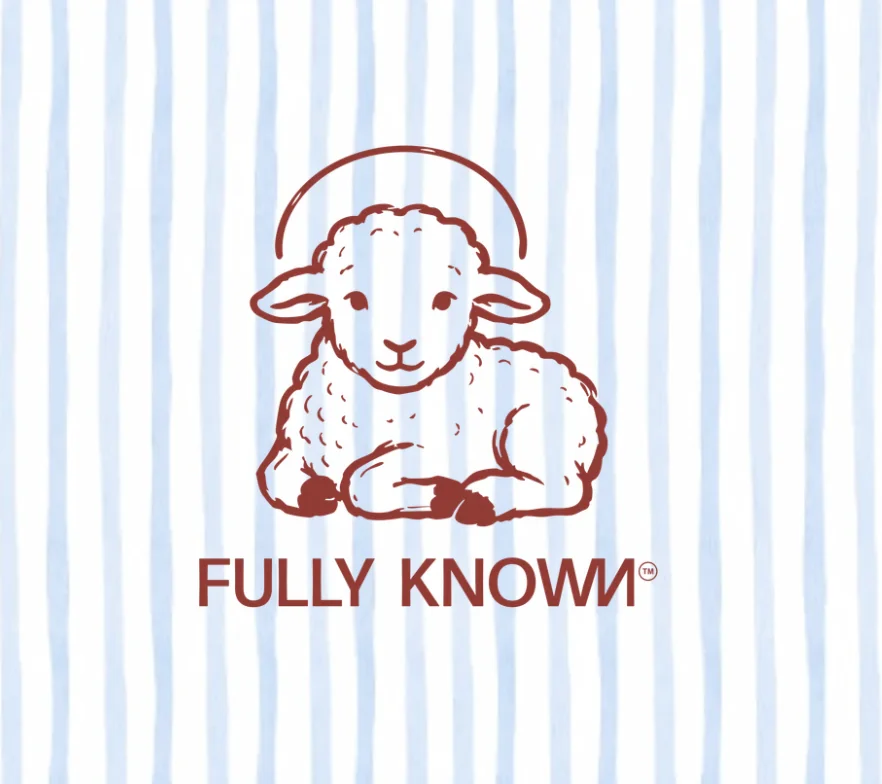 Fully Known card back with the lamb mark on blue stripes