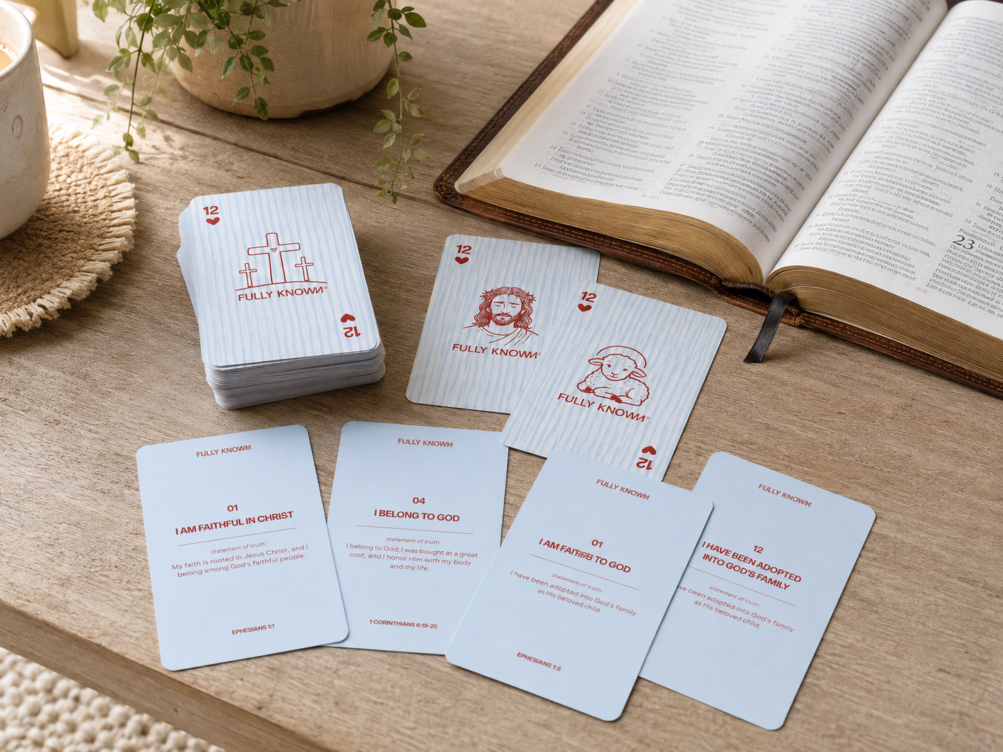 Fully Known card deck arranged beside an open Bible.